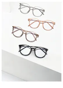 Detail of round TR90 optical frames in transparent, pink, brown, and black colors