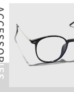 Detailed macro view of retro TR90 round frame glasses with polished silver metal hinges