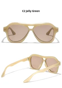 Detail view of C2 jelly green square double-bridge sunglasses with tinted lenses