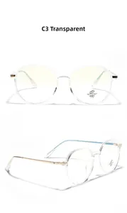 Detail of transparent polygonal frames with gold metal temples and blue light protection