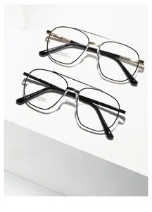 Detail of pilot-style metal frames featuring double bridge design and stainless steel legs