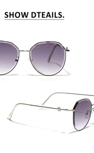 Detail view of silver metal sunglasses with purple gradient lenses and slim hexagonal frame