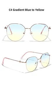 Detail of rose gold metal sunglasses with blue-yellow gradient polygon round lenses