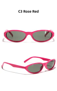 Front and 45-degree side view of rose red oval Y2K sunglasses with dark grey lenses
