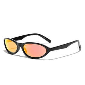 Y2K futuristic oval cat-eye sunglasses with black frame and orange mirrored lenses