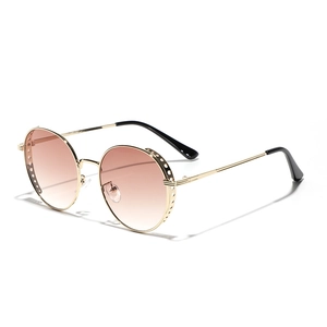 Steampunk round sunglasses with gold hollow metal frame and brown gradient lenses