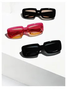 Detailed macro view of trendy rectangular acetate sunglasses with thick frames and chic gradient lenses