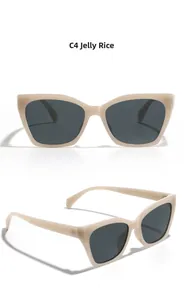 Detail view of jelly beige cat-eye polarized sunglasses with frame specifications and lenses