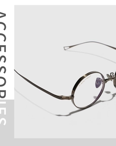 Macro detail of IP 99.99% titanium eyewear frame showing fine texture and material