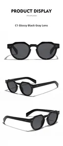 Detailed views of vintage round black sunglasses featuring metal stud accents and gray lenses