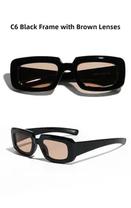 Detail view of rectangular black frame sunglasses with tinted tea-colored lenses