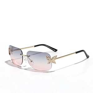 Y2K rimless butterfly sunglasses with gold frames and gradient pink lenses for women
