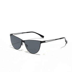 Cat eye sunglasses with black frames and hollow metal temples for a hip hop look