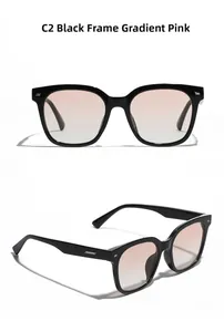 Detailed view of C2 black square frame sunglasses with gradient pink lenses and rivets