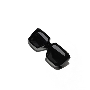 Y2K retro oversized square sunglasses in glossy black frame with dark grey lenses