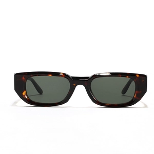 Retro square tortoiseshell sunglasses with dark lenses and amber leopard print frames