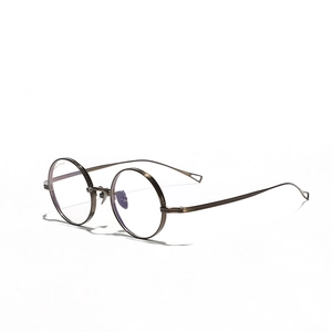 Montatura occhiali rotonda vintage in puro titanio con finitura bronzo antico unisex