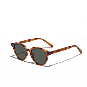 Lunettes de soleil rondes vintage en TR90 avec monture écaillée et verres foncés
