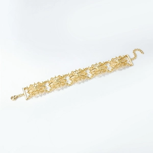 Elegant gold filigree hollowed snowflake link bracelet with lobster clasp closure