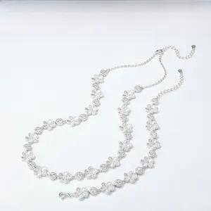 Détail de l'ensemble collier et bracelet en argent S925 fleur de prunier filigrané