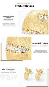 Macro shot of S925 silver carrot earrings with brushed gold finish and cubic zirconia