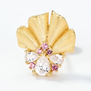 Handcrafted brushed gold flower stud earrings with pink and white teardrop crystals