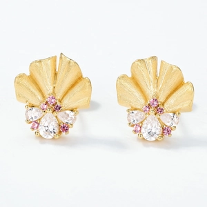 Vintage ginkgo leaf stud earrings in gold with pink gems and a matte brushed finish