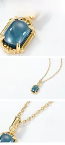 Dettaglio macro del ciondolo topazio blu Londra placcato oro con finitura in argento 925
