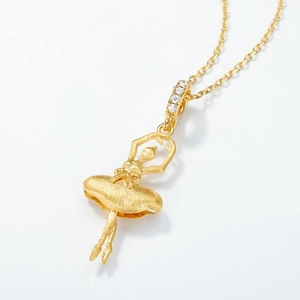 Elegant gold ballerina pendant necklace with matte finish and sparkling zircon accents