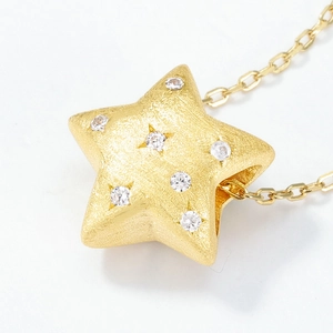 Golden brushed star pendant necklace with micro-paved zircons in 925 sterling silver