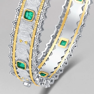 Two-tone S925 silver cuff bracelet with emerald gemstones and brushed texture