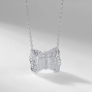 Élégant collier en argent sterling S925 avec pendentif nœud en dentelle évidé