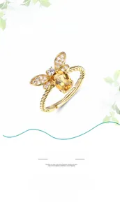 Dettaglio macro dell'anello ape in argento S925 con citrina gialla e fascia regolabile