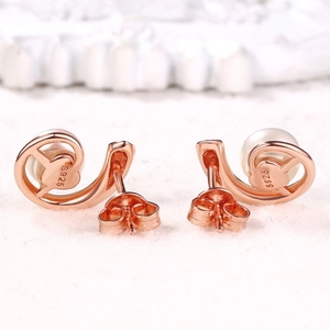 Élégantes boucles d'oreilles perles en argent 925 avec finition or rose pour femme