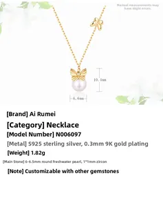Detail of 9K gold plated S925 silver necklace with bow pendant and 6mm freshwater pearl