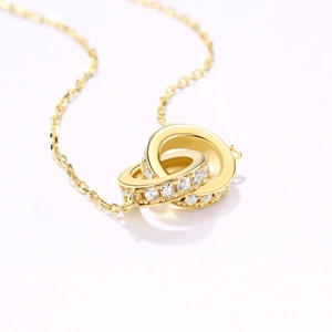 Elegant gold double interlocking circles necklace with micro-pave white zircon stones