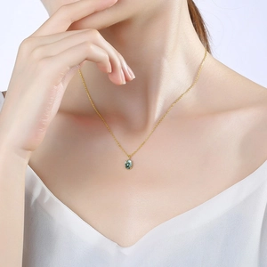 Élégant collier en argent S925 doré avec pendentif goutte en cristal vert ovale