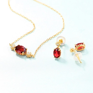 Elegant s925 silver gold-plated jewelry set with oval garnet stones and star-shaped accents