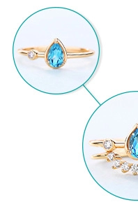 Detail of pear-cut blue opal and white zircon petals on a gold-plated silver ring
