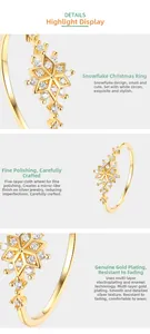 Macro detail of snowflake ring featuring white zircon stones and gold plating