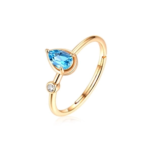 Pear-cut blue topaz and white zircon adjustable ring in gold-plated sterling silver