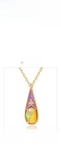 Detailed shot of waterdrop pendant with purple enamel and oval opal stone setting