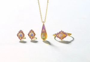Macro shot of vintage style S925 silver jewelry set with purple enamel and opal stones