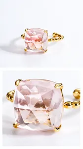 Macro detail of square cut rose quartz stone and gold beaded band on S925 silver ring
