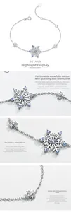 Macro detail of S925 sterling silver snowflake bracelet with blue spinel and white zircon