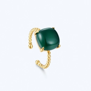 Detail of S925 silver twist ring featuring a square sugar-loaf green gemstone