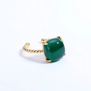 Detailed close-up of S925 silver adjustable ring with green agate in gold bead design