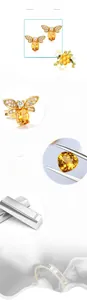 Detailed close-up of 925 silver bee stud earrings with natural citrine and pavé diamonds