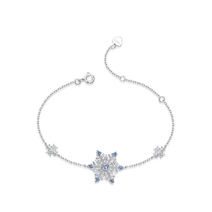 S925 sterling silver snowflake bracelet with blue zircon stones on white background