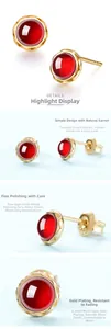 Detailed macro view of S925 sterling silver studs with round natural red garnet stones